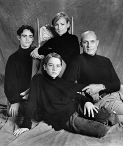 B&W Studio portrait of family dressed in black